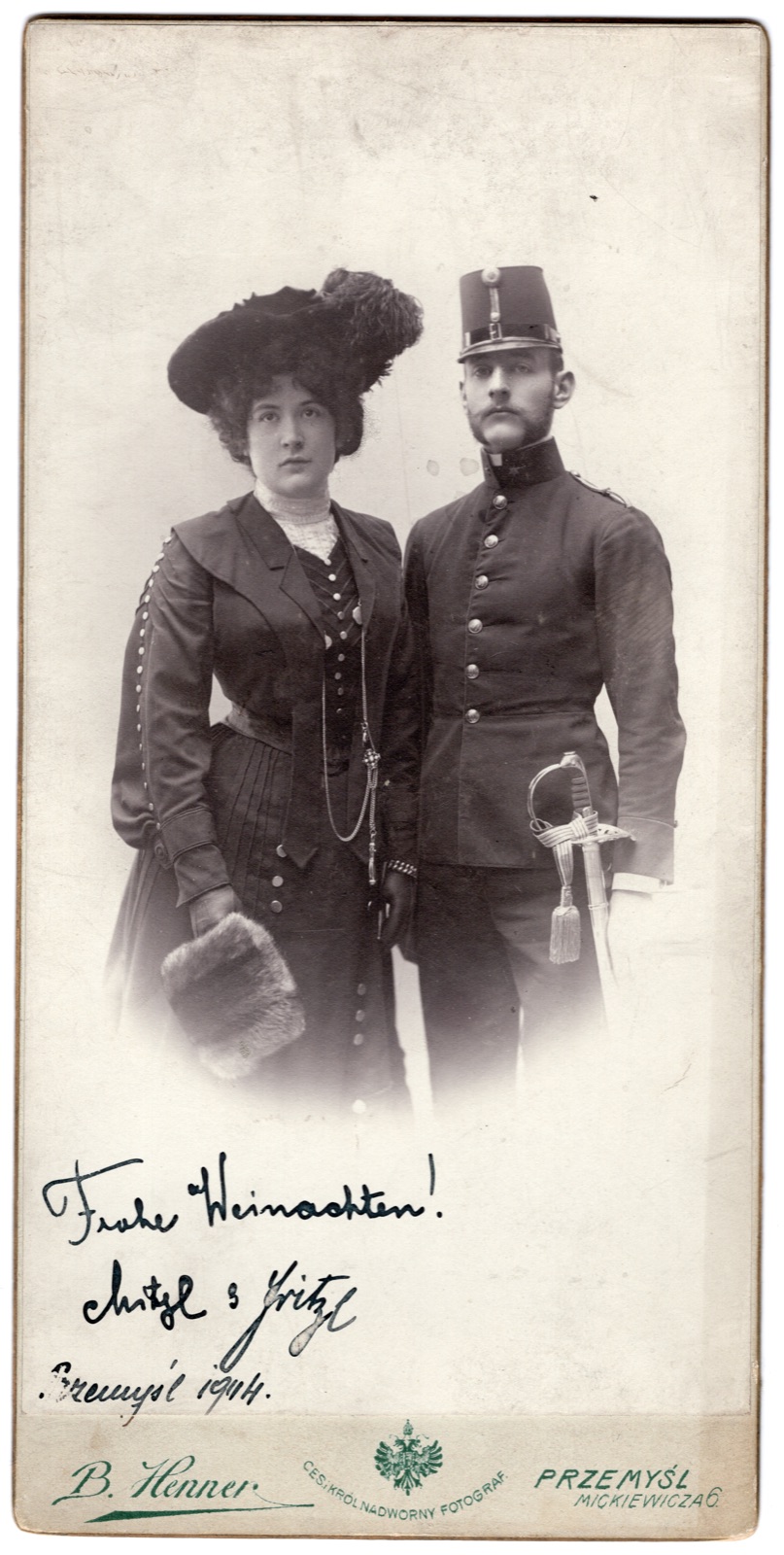 para: kobieta i wojskowy z szablą, kartka bożonarodzeniowa „Mitzi & Fritz”, datowana Przemyśl 1914